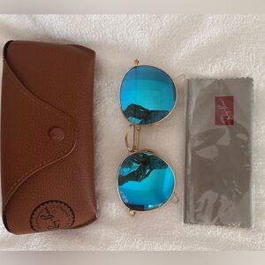 Ray-Ban uni-sex round polarized blue lenses with gold frame